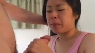 Submissive Asian woman fucked hard and sprayed with semen